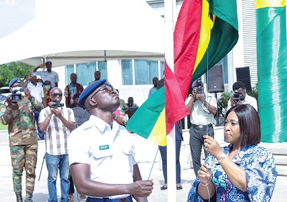 Shirley Ayorkor Botchwey (right), Minister of Foreign Affairs and Regional Integration, hoisting the flag to commemorate the AU Day yesterday